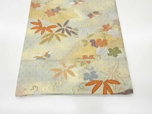  笹に蔓草・鶴・流水模様織出し袋帯